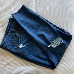 Mid blue ripped skinny jeans